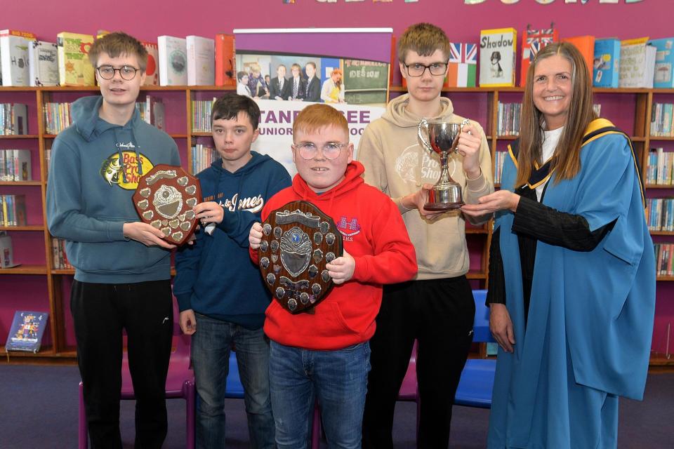 Tandragee Junior High School vice principal, Mrs Laverne Inns pictured with prize winners from the school's Learning Support Unit on prize day. Pupils included from left, Samuel Quinn, Bailey Robinson, Lee Moore and Ryan Quinn. PT44-206. (Photo: Tony Hendron)