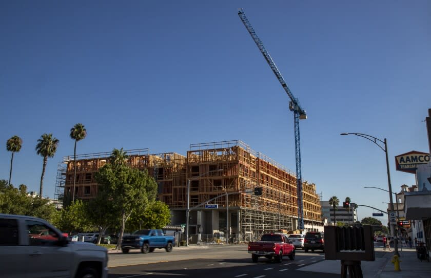 RIVERSIDE CA - AUGUST 6, 2020: Construction is underway for Mark Riverside, a 22,000 square foot retail space with 165 housing units in downtown Riverside, California. Since Covid hit, developers have been straining to get financial backing for housing projects.(Gina Ferazzi / Los Angeles Times)