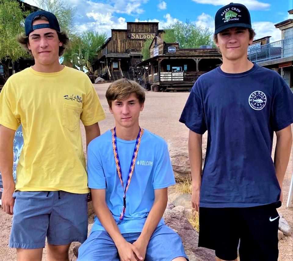 From left, triplets Griffin, Matthew and Connor Wehr, of Marshfield, on a family trip to Arizona in the summer of 2022.