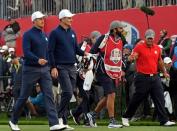 Sep 30, 2016; Chaska, MN, USA; Henrik Stenson of Sweden and Justin Rose of England walk off the first tee in the morning foursome matches during the 41st Ryder Cup at Hazeltine National Golf Club. Mandatory Credit: Michael Madrid-USA TODAY Sports