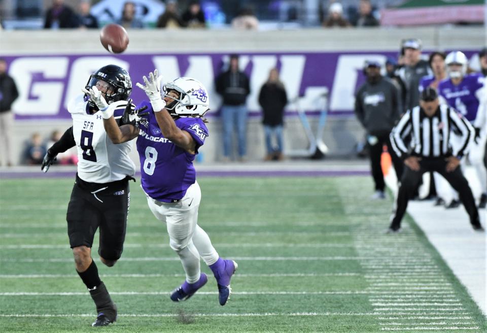 ACU receiver Kobe Clark, right, can't come up with a catch as Tkai Lloyd defends. The catch would have kept the Wildcats' drive alive after Stephen F. Austin had taken a 24-21 lead with 2:43 left in the game. But Maverick McIvor's pass was a little too far.