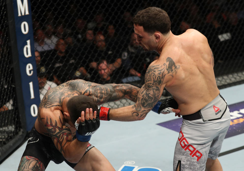 ATLANTIC CITY, NJ - APRIL 21:  (R-L) Frankie Edgar punches Cub Swanson in their featherweight fight during the UFC Fight Night event at the Boardwalk Hall on April 21, 2018 in Atlantic City, New Jersey. (Photo by Patrick Smith/Zuffa LLC/Zuffa LLC via Getty Images)