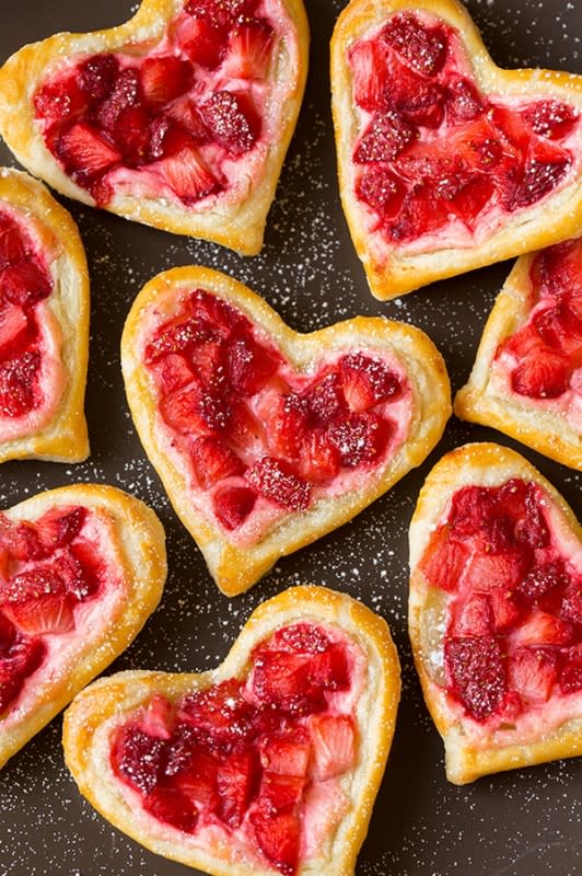 <p>Cooking Classy</p><p>Store-bought puff pastry, tangy cream cheese filling and sweet strawberry topping lead to the best morning bite.</p><p><strong>Get the recipe: <a href="http://www.cookingclassy.com/heart-shaped-strawberry-cream-cheese-breakfast-pastries/" rel="nofollow noopener" target="_blank" data-ylk="slk:Cream Cheese Breakfast Pastries;elm:context_link;itc:0;sec:content-canvas" class="link ">Cream Cheese Breakfast Pastries</a></strong></p>