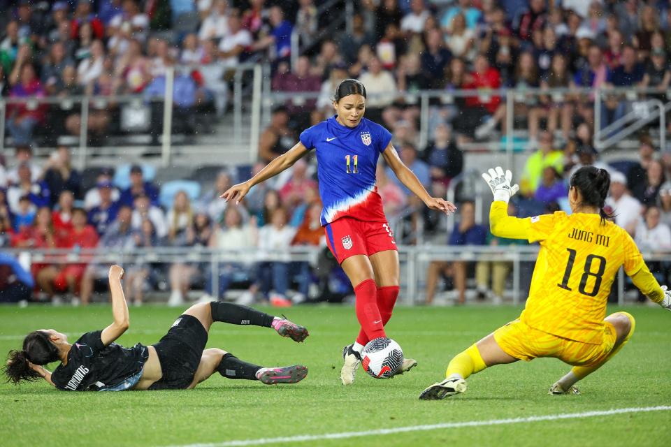 Sophia Smith (11) controls the ball as Korea Republic goalkeeper Kim Jung-mi (18) defends during the second half at Allianz Field.