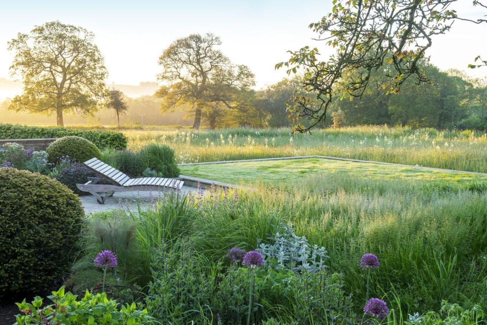 a garden with a bridge