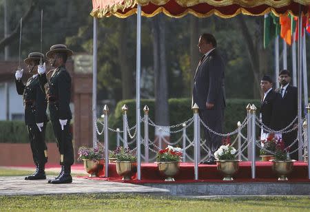 Pakistani Prime Minister Nawaz Sharif receives a guard of honour upon his arrival to take part in the 18th South Asian Association for Regional Cooperation (SAARC) summit in Kathmandu November 25, 2014. REUTERS/Navesh Chitrakar