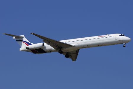 A Swiftair MD-83 airplane is seen in this undated photo. Authorities have lost contact with an Air Algerie flight en route from Ouagadougou in Burkina Faso to Algiers with 110 passengers on board. REUTERS/Xavier Larrosa