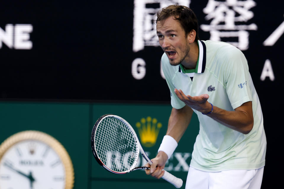 Daniil Medvedev of Russia reacts during his fourth round match against Maxime Cressy of the U.S. at the Australian Open tennis championships in Melbourne, Australia, Monday, Jan. 24, 2022. (AP Photo/Hamish Blair)