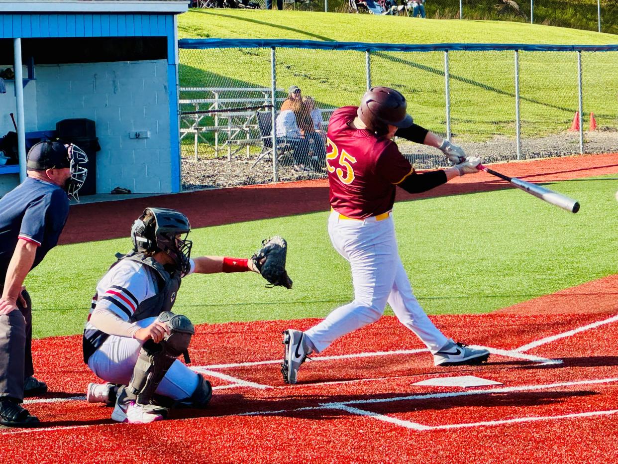 Berne Union's Hudson Gerken, who pitched eight innings of one-hit, shutout baseball, takes a big swing at the plate against Fairfield Christian Academy on Thursday at Beavers Field, The Knights pulled out a 1-0, 10-inning win.