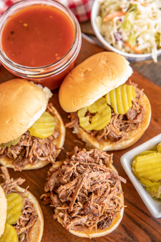 <p>Plain Chicken</p><p>Beef roast cooked in a combo of pineapple juice, maple syrup and peppers leads to a smokey and sweet treat.</p><p><strong>Get the recipe: <a href="https://www.plainchicken.com/slow-cooker-maple-chipotle-beef-sliders/" rel="nofollow noopener" target="_blank" data-ylk="slk:Slow Cooker Maple Chipotle Beef Sliders;elm:context_link;itc:0;sec:content-canvas" class="link ">Slow Cooker Maple Chipotle Beef Sliders</a></strong></p>