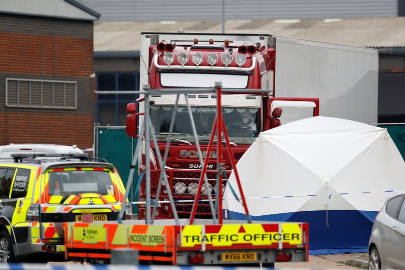 The scene where bodies were discovered in a lorry container, in Grays, Essex