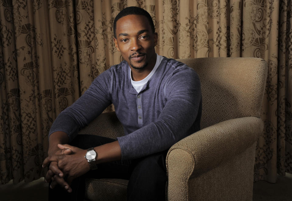 In this Wednesday, March 12, 2014 photo, Anthony Mackie, a cast member in "Captain America: The Winter Soldier," poses for a portrait in Beverly Hills, Calif. Mackie plays the role of Falcon in the Marvel/Disney movie which releases on Friday, April 4, 2014. (Photo by Chris Pizzello/Invision/AP)