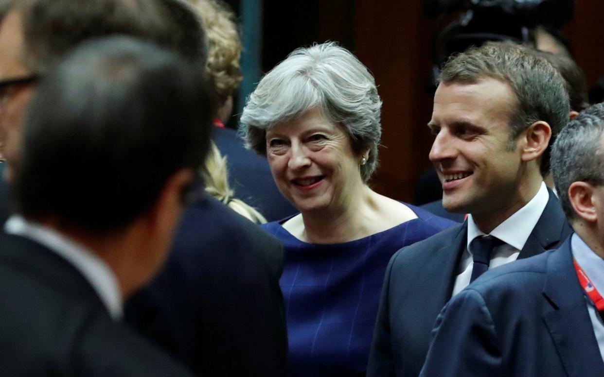 Prime Minister Theresa May and French President Emmanuel Macron - REUTERS