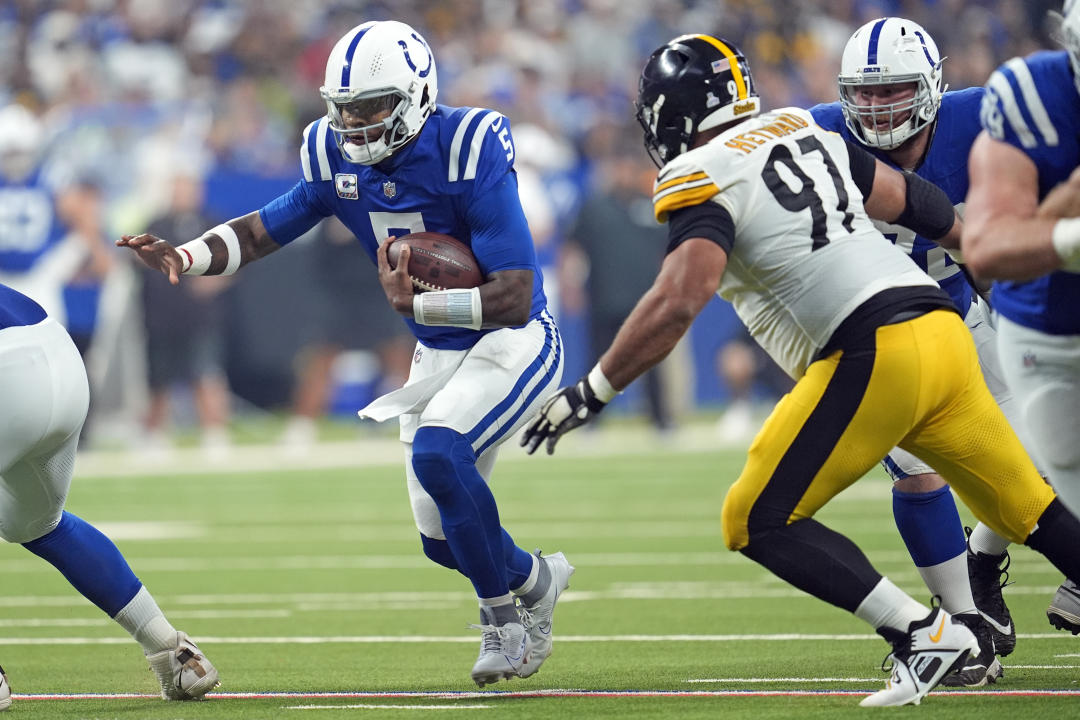 Indianapolis Colts quarterback Anthony Richardson (5) with Pittsburgh Steelers defensive tackle Cameron Heyward (97) in pursuit during the first half of an NFL football game Sunday, Sept. 29, 2024, in Indianapolis. (AP Photo/Michael Conroy)