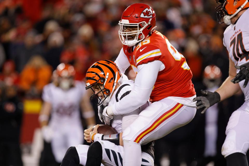 KANSAS CITY, MISSOURI - JANUARY 29: Chris Jones #95 of the Kansas City Chiefs sacks Joe Burrow #9 of the Cincinnati Bengals during the first quarter in the AFC Championship Game at GEHA Field at Arrowhead Stadium on January 29, 2023 in Kansas City, Missouri. (Photo by David Eulitt/Getty Images)