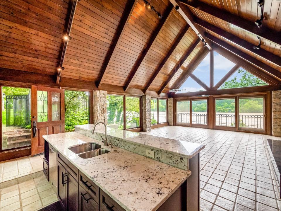 A boathouse overlooks the Scioto River in a home listed for sale on Dublin Road.