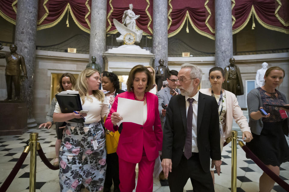 House Speaker Nancy Pelosi of Calif., walks to the House floor from her office on Capitol Hill, Thursday, June 27, 2019 in Washington. (AP Photo/Alex Brandon)