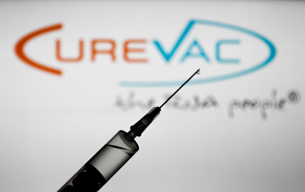 Medical syringe is seen with Curevac company logo displayed on a screen in the background in this illustration photo taken in Poland on November 16, 2020. (Photo by Jakub Porzycki/NurPhoto via Getty Images)