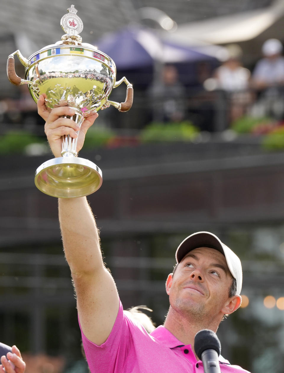 Rory McIlroy, of Northern Ireland, raises the trophy after winning the final round of the Canadian Open golf tournament in Toronto, Sunday, June 12, 2022. (Frank Gunn/The Canadian Press via AP)