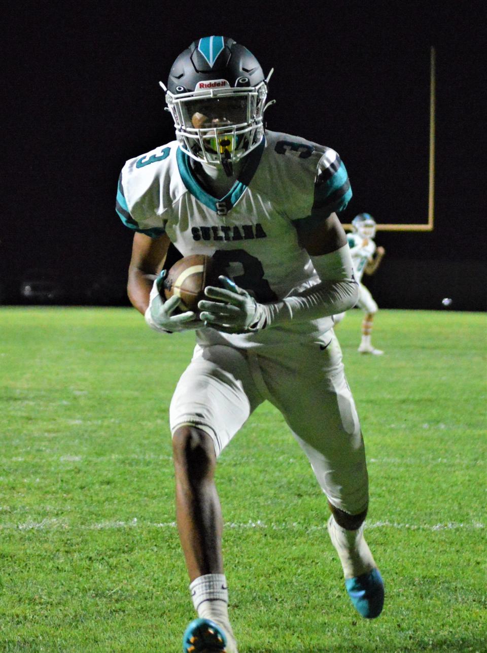 Sultana's LaMason Waller runs the ball in for a touchdown after catching a pass from Jacob Higgs against Barstow on Aug. 25.