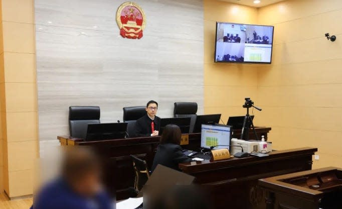 A photo taken during Yang's hearing.