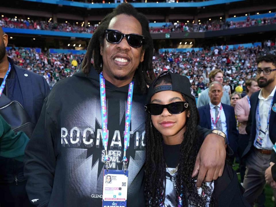 <p>Kevin Mazur/Getty</p> JAY-Z and Blue Ivy Carter in Arizona in February 2023