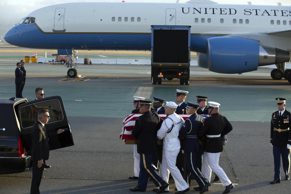 An armed forces color guard carries a casket containing the body of U.S. Sen. Dianne Feinstein, D-Calif., at San Francisco International Airport, Saturday, Sept. 30, 2023, in San Francisco. (AP Photo/D. Ross Cameron)