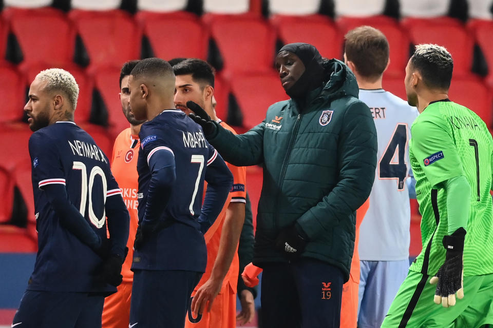 Istanbul Basaksehir's French forward Demba Ba (2ndR) reacts past Paris Saint-Germain's Brazilian forward Neymar (L) and Paris Saint-Germain's French forward Kylian Mbappe (2ndL) during the UEFA Champions League group H football match between Paris Saint-Germain (PSG) and Istanbul Basaksehir FK at the Parc des Princes stadium in Paris, on December 8, 2020. (Photo by FRANCK FIFE / AFP) (Photo by FRANCK FIFE/AFP via Getty Images)