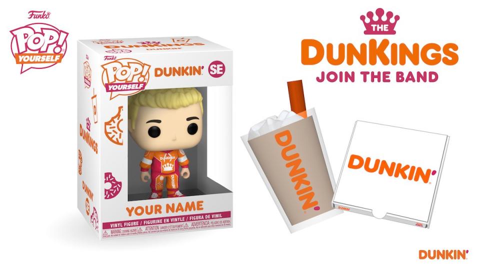 A DunKings Funko Pop in the box with large ice coffee and donut box accessory