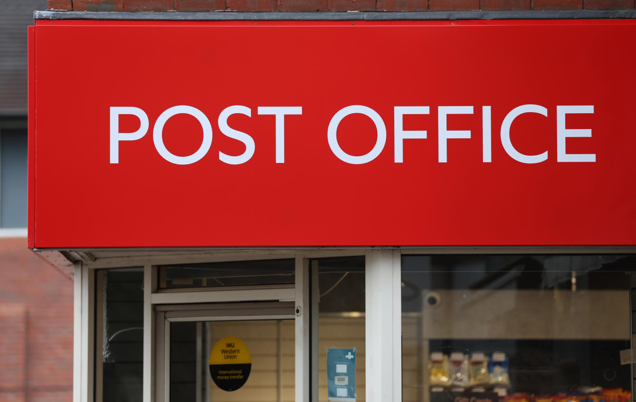 SANDBACH, ENGLAND - JANUARY 08:  The logo of the Post Office is displayed outside one of its branches on January 08, 2024 in Sandbach, United Kingdom. (Photo by Nathan Stirk/Getty Images)