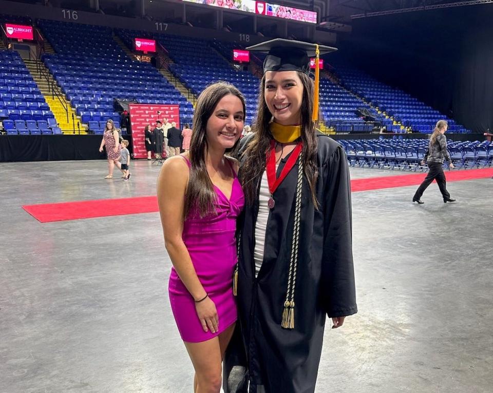 Megan Misurelli (right) with her sister Melissa at Albright College's commencement.