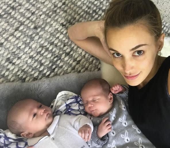 Rebecca Judd cuddles up to her newborn twins. Source: Instagram