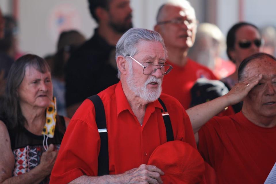 Attendees join in the Old Glory Memorial's annual Flag Day ceremony, which was on its 20th anniversary, on Wednesday.