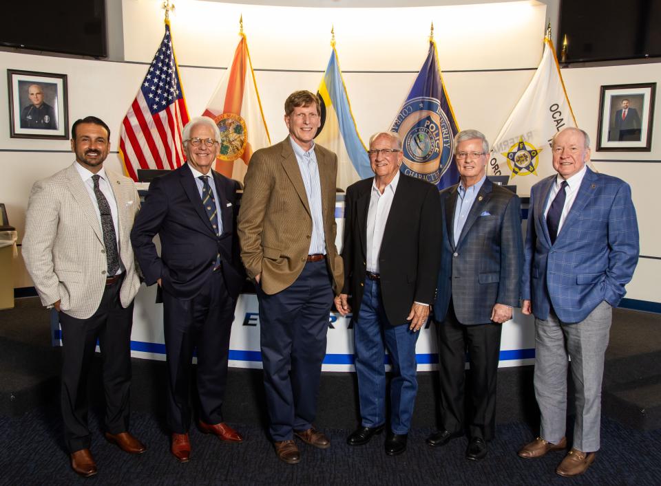 Ocala Mayor Benjamin Marciano, from left, and former mayors Reuben Kent Guinn, Randall “Randy” Ewers, Gerald K. Ergle, Craig Curry and Wayne L. Rubians gathered Wednesday at the Ocala Police Department to talk about their experiences.