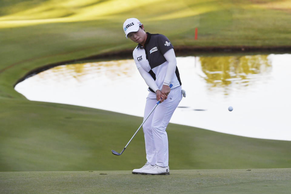 Eun-Hee Ji, of South Korea, hits onto the 18th green during the second round of the LPGA Walmart NW Arkansas Championship golf tournament, Saturday, Sept. 25, 2021, in Rogers, Ark. (AP Photo/Michael Woods)