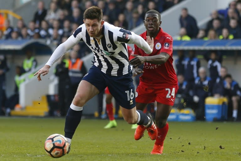 Millwall's Calum Butcher (L) vies with Leicester City's Nampalys Mendy during their English FA Cup fifth round football match in south London on February 18, 2017