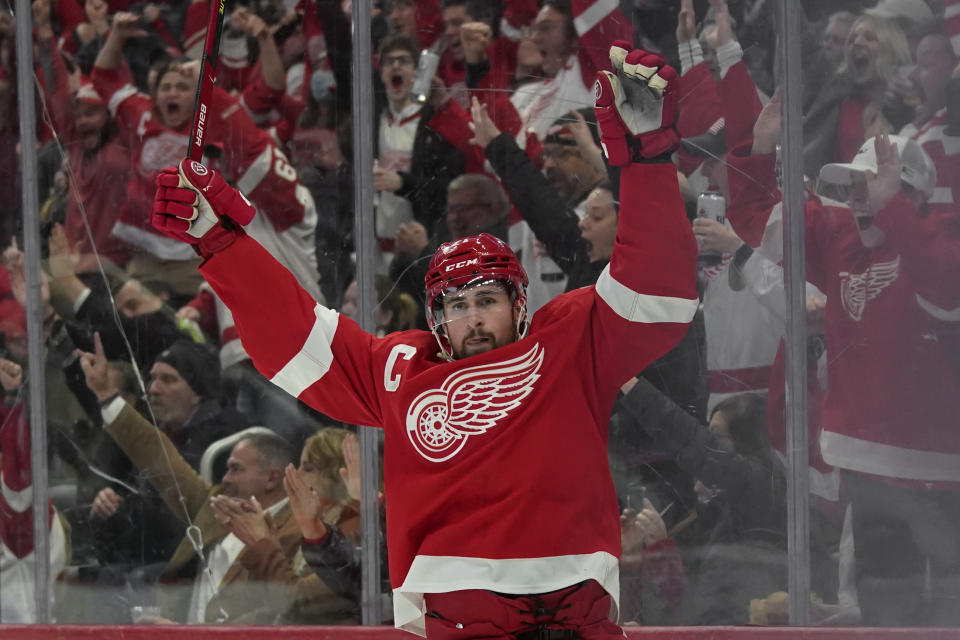 Detroit Red Wings center Dylan Larkin (71) celebrates his goal against the Dallas Stars in the second period of an NHL hockey game Friday, Jan. 21, 2022, in Detroit. (AP Photo/Paul Sancya)