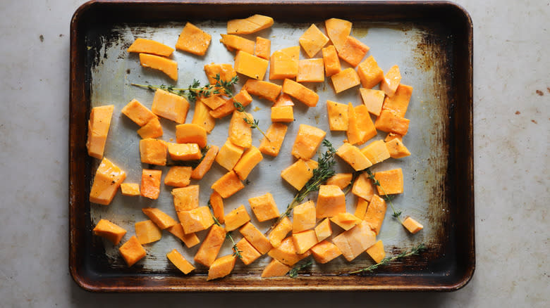 Raw pumpkin on sheet tray