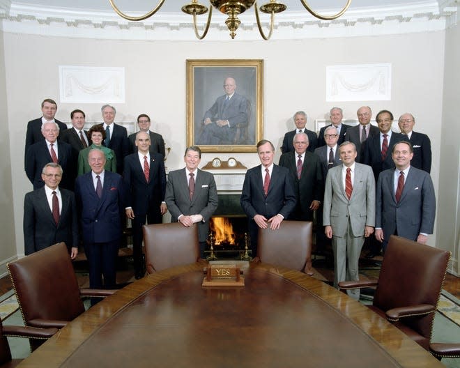 Lauro Cavazos (back row, third from left) was the first Hispanic person to serve in the U.S. Cabinet. Former President Ronald Reagan appointed him Secretary of Education in 1988.