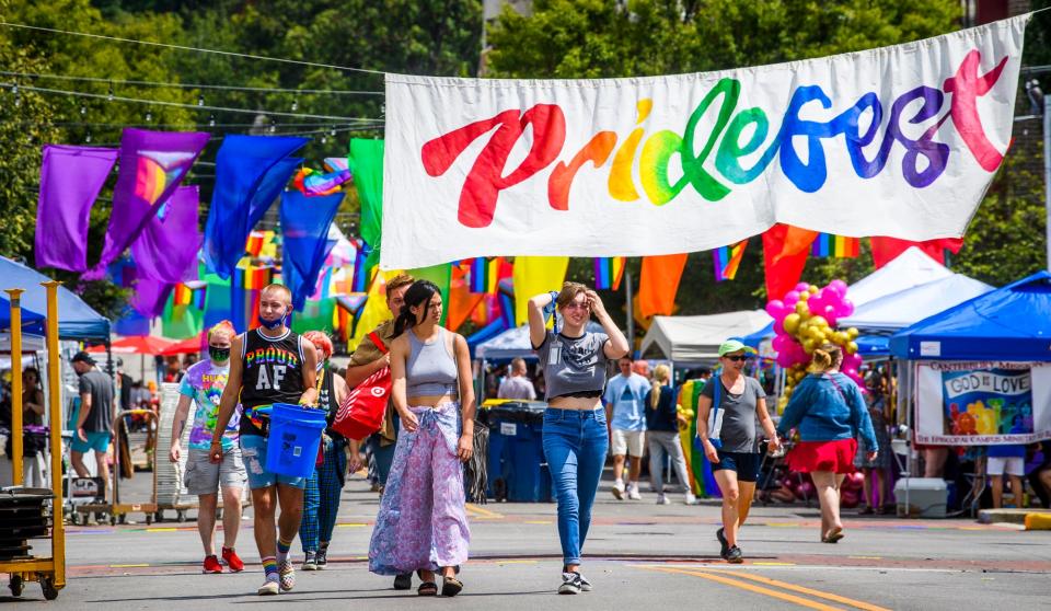 Pridefest attendees in 2021 explored the vendor and information booths even with high temperatures. This year the temperatures are expected to be in the high 80s for the event that happens along East Kirkwood Avenue.