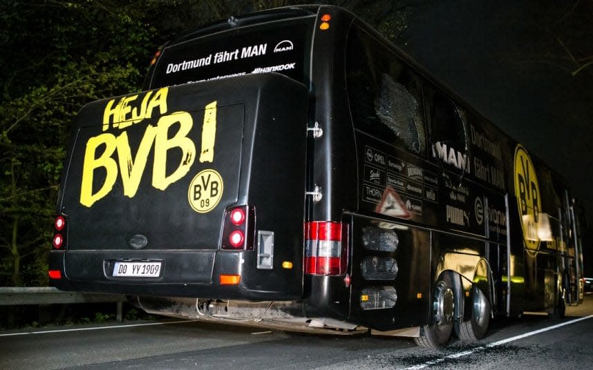 The Borussia Dortmund bus after the explosions - Credit: Maja Hitij/Getty