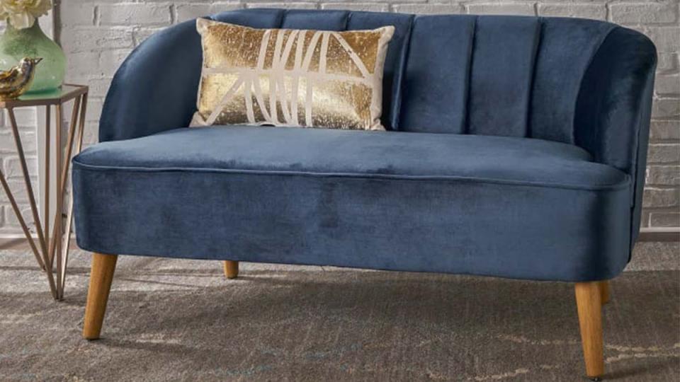 This modern velvet sofa comes in a variety of luxe colors.