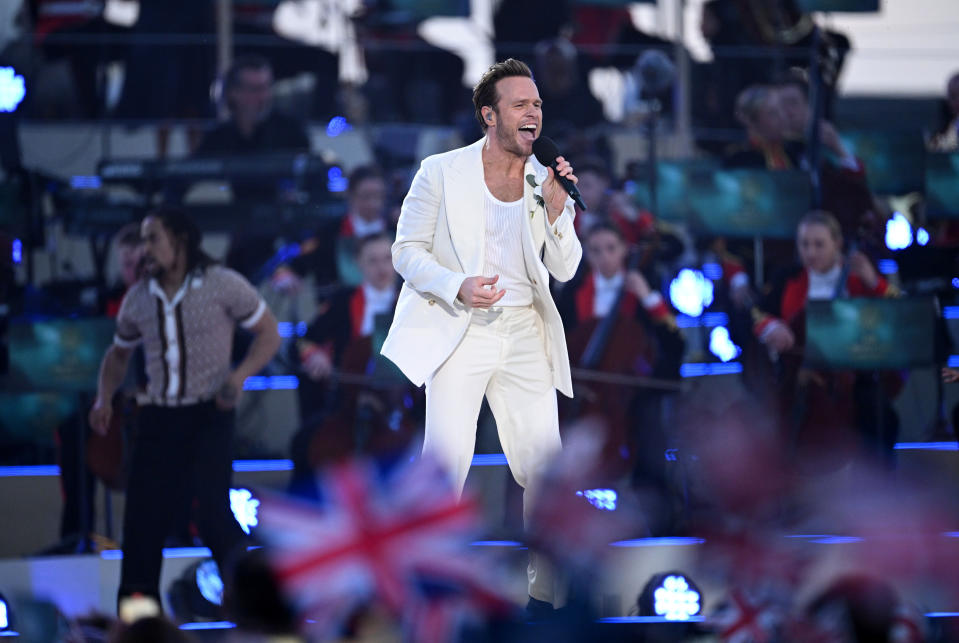 WINDSOR, ENGLAND - MAY 07: Olly Murs performs on stage during the Coronation Concert on May 07, 2023 in Windsor, England. The Windsor Castle Concert is part of the celebrations of the Coronation of Charles III and his wife, Camilla, as King and Queen of the United Kingdom of Great Britain and Northern Ireland, and the other Commonwealth realms that took place at Westminster Abbey yesterday. High-profile performers will entertain members of the royal family and 20,000 guests including 10,000 members of the public. (Photo by Leon Neal/Getty Images)