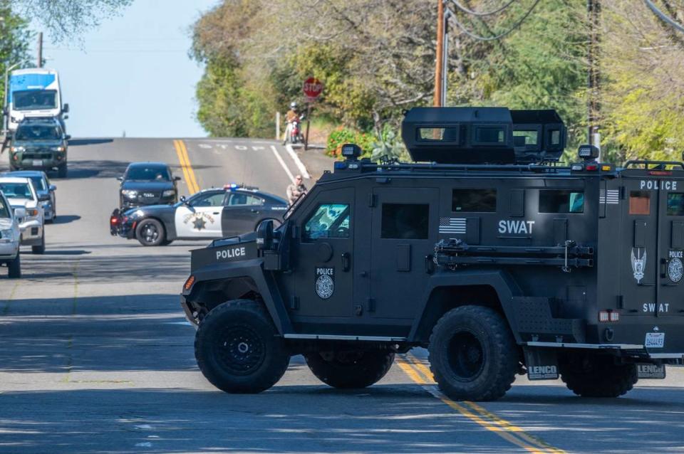 A Sacramento Police SWAT vehicle arrives on the scene after gunfire erupted at the Hazel Ranch apartment complex in the 8800 block of Winding Way in Fair Oaks on Friday. Renée C. Byer/rbyer@sacbee.com