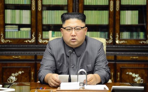 North Korean leader Kim Jong-un delivers a statement in response to US President Donald Trump's speech to the United Nations, in Pyongyang, North Korea - Credit: Korean Central News Agency/Korea News Service via AP