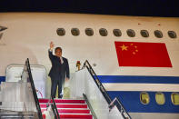 In this photo released by Malaysia's Department of Information, China's Premier Li Qiang waves as he arrives at Sepang International Airport in Kuala Lumpur, Malaysia, Tuesday, June 18, 2024. (Malaysia's Department of Information via AP)