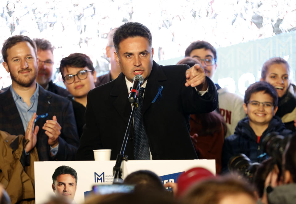 Conservative independent candidate Peter Marki-Zay celebrates in Budapest, Hungary, Sunday, Oct. 17, 2021, after he won an opposition primary race in Hungary, making him nominee of a six-party opposition coalition who will lead a challenge to right-wing populist Prime Minister Viktor Orban in national elections next spring. (AP Photo/Laszlo Balogh)