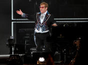 <p><a href="https://people.com/tag/elton-john/" rel="nofollow noopener" target="_blank" data-ylk="slk:Elton John;elm:context_link;itc:0;sec:content-canvas" class="link ">Elton John</a> dazzles in a shiny ensemble as he performs at Dodger Stadium in Los Angeles on Nov. 20 during a live Disney+ event. </p>