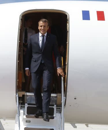 French President Emmanuel Macron arrives at the airport in Salzburg, Austria, August 23, 2017. REUTERS/Heinz-Peter Bader