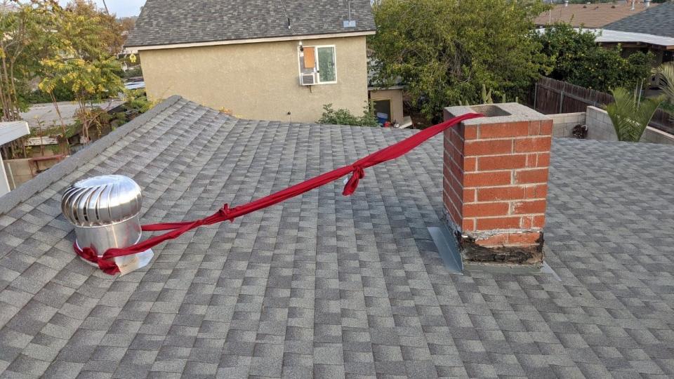 A Department of Animal Services officer used bed sheets to save a kitten, Rudy, trapped in a chimney in Jurupa Valley on Tuesday, Nov. 16, 2021.